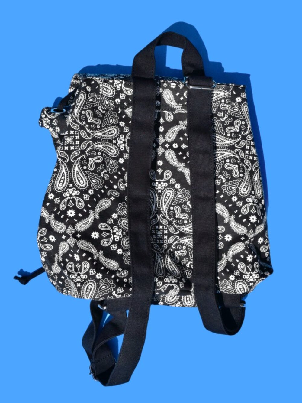 Mini canvas backpack featuring a bold black-and-white bandana/paisley print. Per - Picture 4 of 6